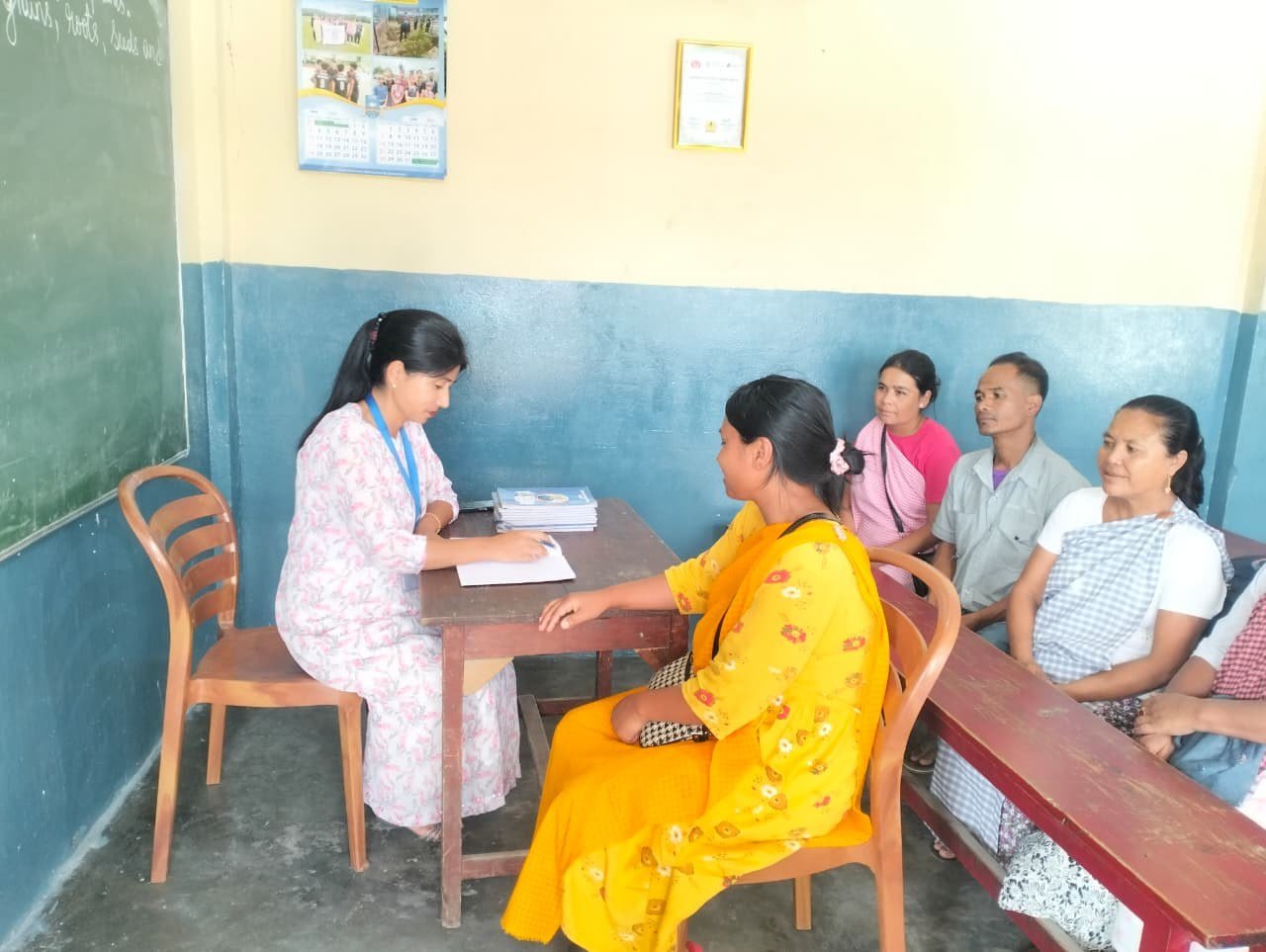 Parent-teacher meeting in classroom